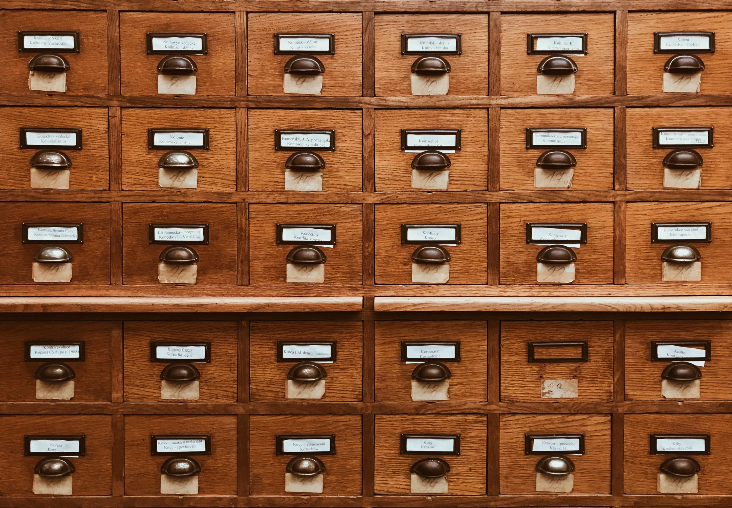 A wall of card-catalog drawers